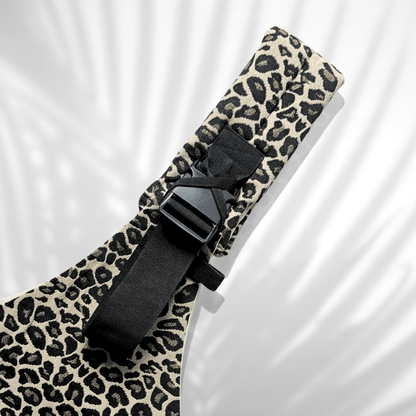 Porte-bébé Kidee panthère – accessoire confort et design pour Noël et voyages en famille